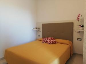 Postel nebo postele na pokoji v ubytování B&B Metropols Sottomarina