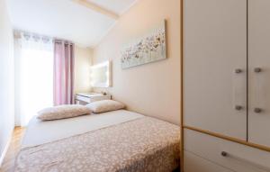 Posteľ alebo postele v izbe v ubytovaní Apartment Raduniceva V