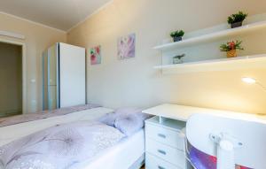 Posteľ alebo postele v izbe v ubytovaní Apartment Raduniceva V