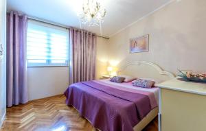 Posteľ alebo postele v izbe v ubytovaní Apartment Raduniceva V