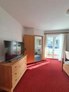 Μια τηλεόραση ή/και κέντρο ψυχαγωγίας στο Gästehaus Alpenkranz