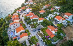 an aerial view of a village next to the water at Gorgeous Home In Pisak With Wifi in Pisak +15 photos