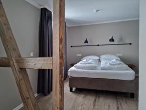 Katil atau katil-katil dalam bilik di Gistihúsið - Lake Hotel Egilsstadir