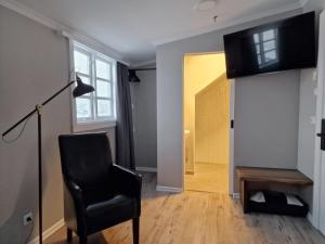Televisyen dan/atau pusat hiburan di Gistihúsið - Lake Hotel Egilsstadir