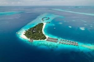 une île au milieu de l'océan dans l'établissement Coco Bodu Hithi, à Atoll Malé Nord