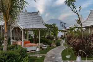 Zahrada ubytování Paus Putih Hotel