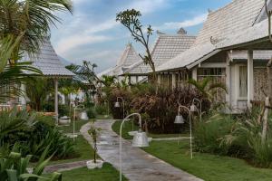 Zahrada ubytování Paus Putih Hotel