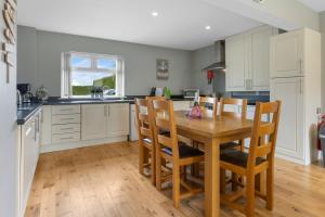 Kuchyň nebo kuchyňský kout v ubytování Benone Getaways