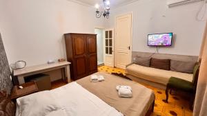 Postel nebo postele na pokoji v ubytování Elross Hotel