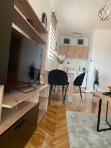 Apartman Una的电视和/或娱乐中心