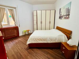 Кровать или кровати в номере Elegant Apartment Villa Bianca