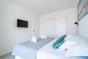 Posteľ alebo postele v izbe v ubytovaní Apartment Raguseo