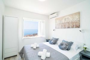Posteľ alebo postele v izbe v ubytovaní Apartment Raguseo