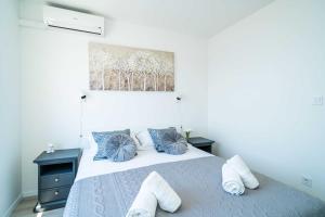 Posteľ alebo postele v izbe v ubytovaní Apartment Raguseo