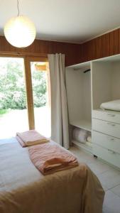 Giường trong phòng chung tại Rincon tranquilo en el valle