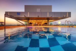 The swimming pool at or close to Amàre Beach Hotel Ibiza - Adults Recommended