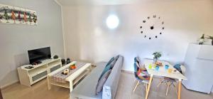 TV a/nebo společenská místnost v ubytování Ferienwohnung Calma