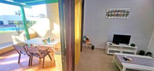 TV a/nebo společenská místnost v ubytování Ferienwohnung Calma