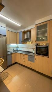 Η κουζίνα ή μικρή κουζίνα στο Apartamento Saudade