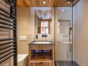 a bathroom with a sink and a shower at Appartement luxe 4 pièces + studio, terrasse Sud, centre Val-d'Isère, 2023, 8 personnes - FR-1-694-149 in Val dʼIsère +9 photos