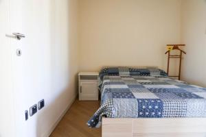 Postel nebo postele na pokoji v ubytování Casa Monia By Case al Lago