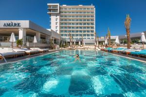 The swimming pool at or close to Amàre Beach Hotel Ibiza - Adults Recommended