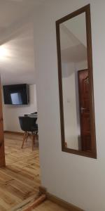 Televízia a/alebo spoločenská miestnosť v ubytovaní Villa Basia