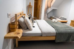 Łóżko lub łóżka w pokoju w obiekcie Apartment Andrea in Malaga Center