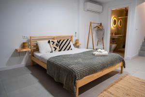 Łóżko lub łóżka w pokoju w obiekcie Apartment Andrea in Malaga Center