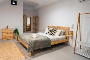 Łóżko lub łóżka w pokoju w obiekcie Apartment Andrea in Malaga Center