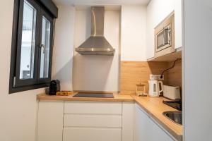 Kuchnia lub aneks kuchenny w obiekcie Apartment Andrea in Malaga Center