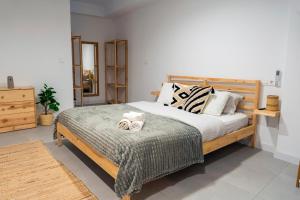 Łóżko lub łóżka w pokoju w obiekcie Apartment Andrea in Malaga Center