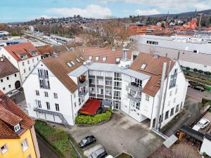 an overhead view of a large white house in a city at Kim Fewo 2 in Emmendingen