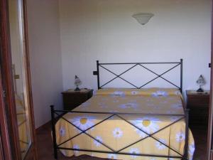 Postel nebo postele na pokoji v ubytování Agriturismo Il Rustico