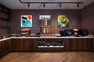 A kitchen or kitchenette at NYX Hotel Dublin Portobello