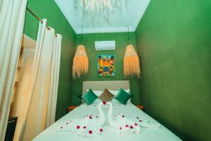 Postel nebo postele na pokoji v ubytování Hotel & Riad Veridis