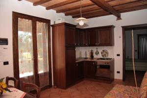 Kuchyň nebo kuchyňský kout v ubytování Agriturismo Il Rustico
