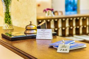 a table with a tea kettle on top of it at Rena Hotel - All Inclusive in Sunny Beach +68 photos