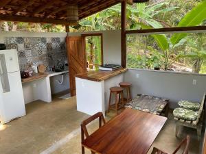 Kuchyň nebo kuchyňský kout v ubytování Paraíso da Mata Itacaré