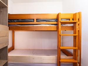 Palanda nebo palandy na pokoji v ubytování Les Sitelles - 12 - Appt vue montagne - 6 pers