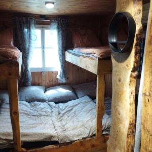 Postel nebo postele na pokoji v ubytování Almhütte