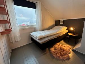 Postel nebo postele na pokoji v ubytování Panorama Valley Lofoten