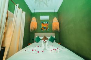 Postel nebo postele na pokoji v ubytování Hotel & Riad Veridis