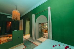 Postel nebo postele na pokoji v ubytování Hotel & Riad Veridis