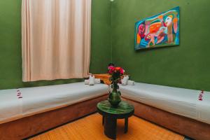 Postel nebo postele na pokoji v ubytování Hotel & Riad Veridis