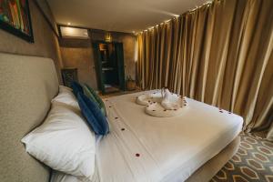 Postel nebo postele na pokoji v ubytování Hotel & Riad Veridis