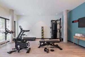 a gym with two exercise bikes in a room at Residence Inn by Marriott Hamburg Altona in Hamburg