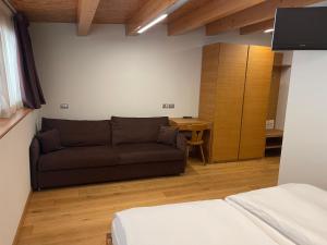 Postel nebo postele na pokoji v ubytování Agritur Anselmi