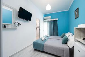 TV a/nebo společenská místnost v ubytování Lefteris Apartment