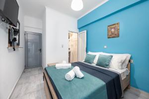 Postel nebo postele na pokoji v ubytování Lefteris Apartment